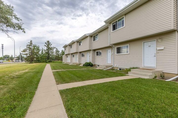 Property Photo: 55 Lemoyne Crescent W 43 AB T1K 4J7