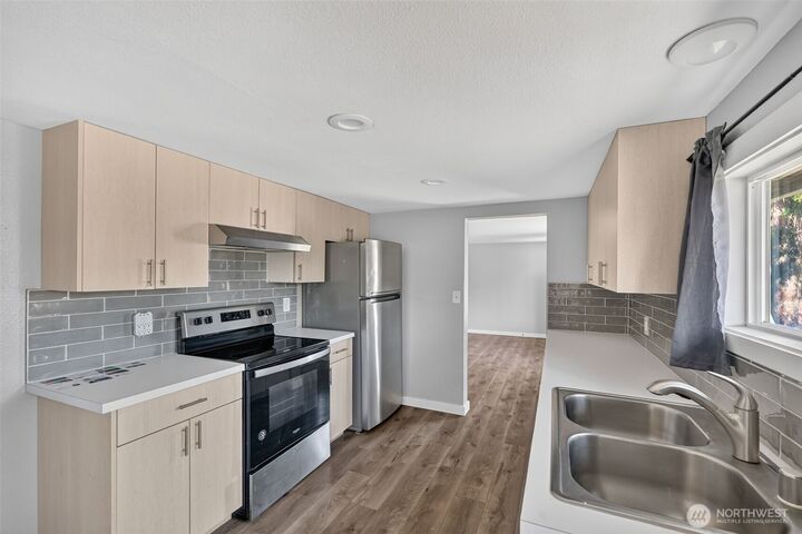 Property Photo:  1402  Violet Meadow Street S  WA 98444 