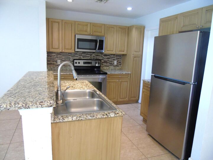 Property Photo:  6691 Old Farm Trail  FL 33437 