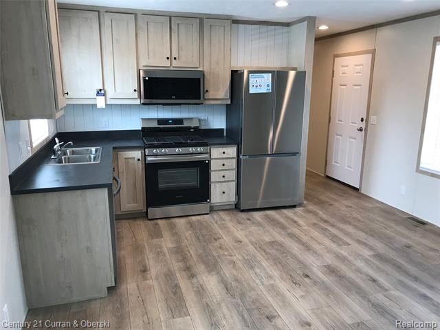 Property Photo:  6564 E Michigan Avenue 81  MI 48176 