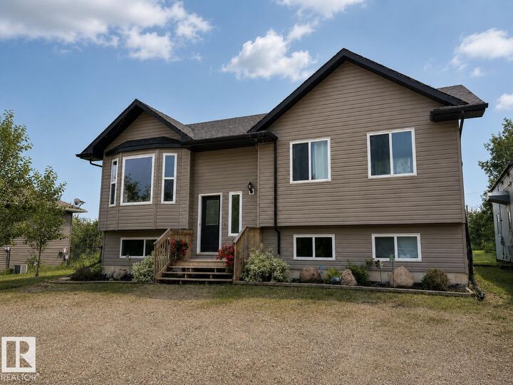 Property Photo: 46410 Twp Rd 610 405 AB T9N 2H1