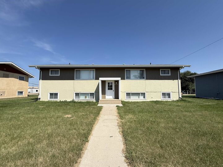 Property Photo:  2026 NW 4th St NW  ND 58703 