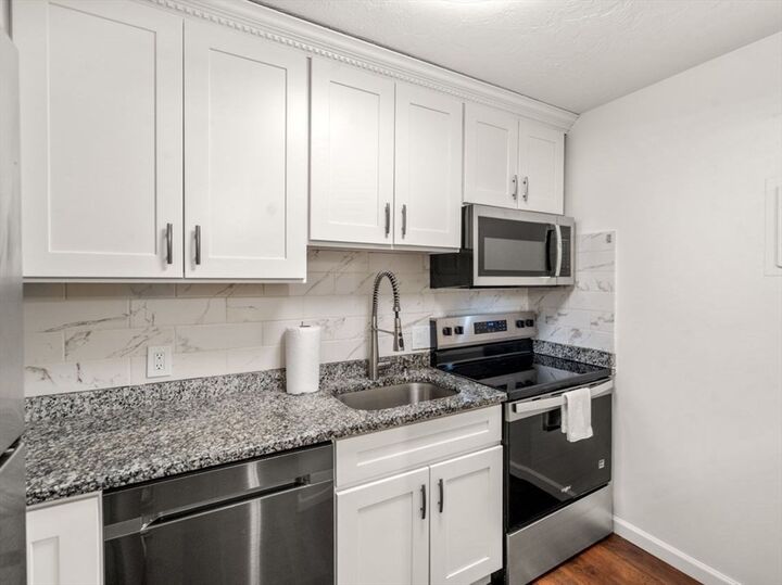 Property Photo:  21 Erick Rd 18  MA 02048 