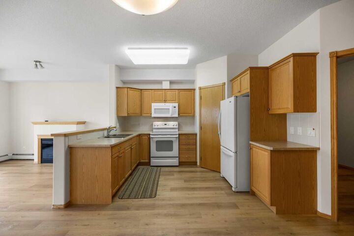 Property Photo: 151 Country Village Road NE 2458 AB T3K 5X5