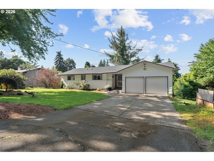 Property Photo:  12441 SE Knapp St  OR 97236 