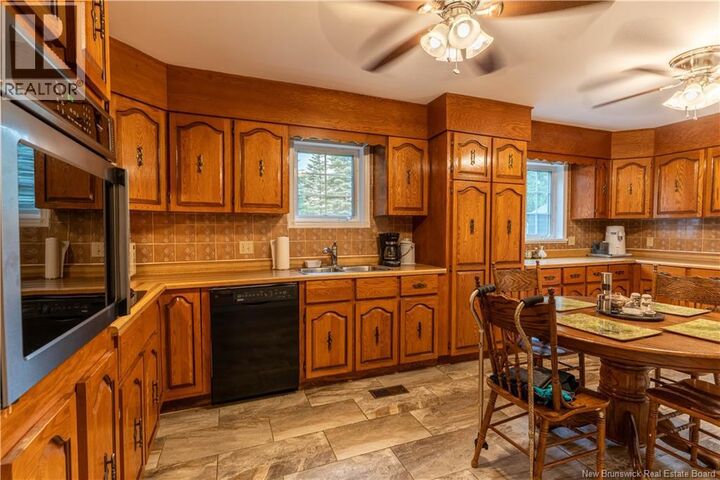 Property Photo:  56 Aitken Avenue  NB E1V 3X1 