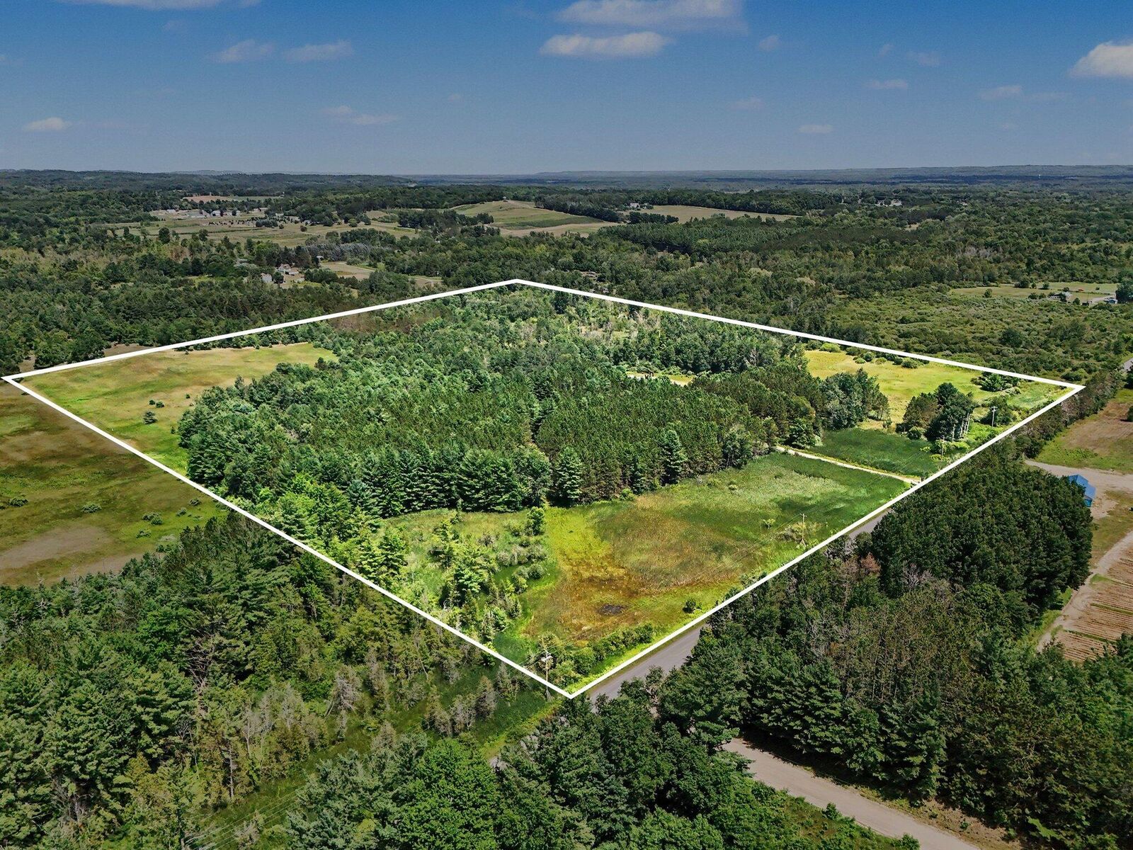 Property Photo:  9638 8 Mile Road  MI 49645 