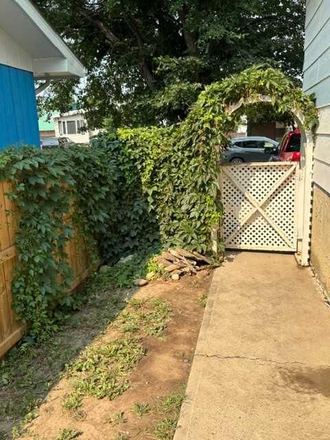 Property Photo:  5811A 50 Street N  AB T1G 1K6 