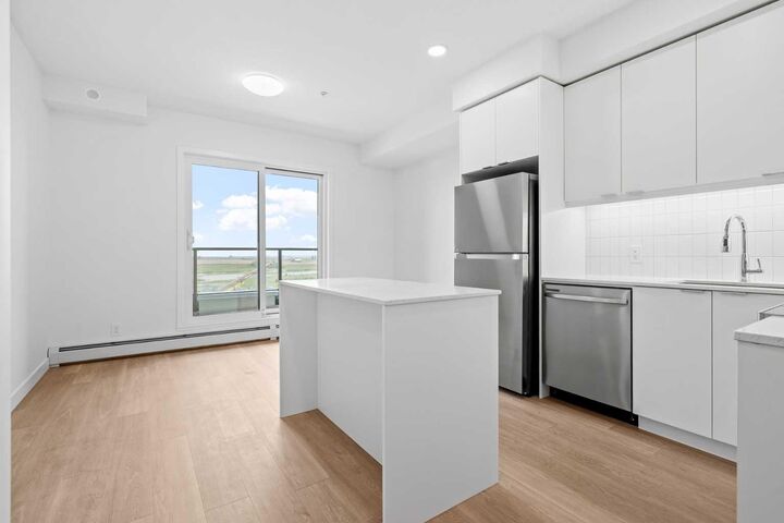 Property Photo:  8500 19 Avenue SE 4215  AB T2A 7V1 