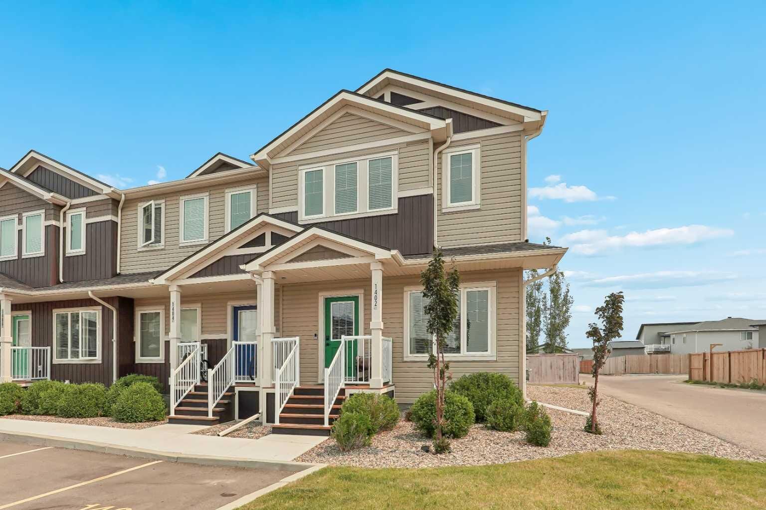 Property Photo: 210 Firelight Way W 1402 AB T1J 5T3