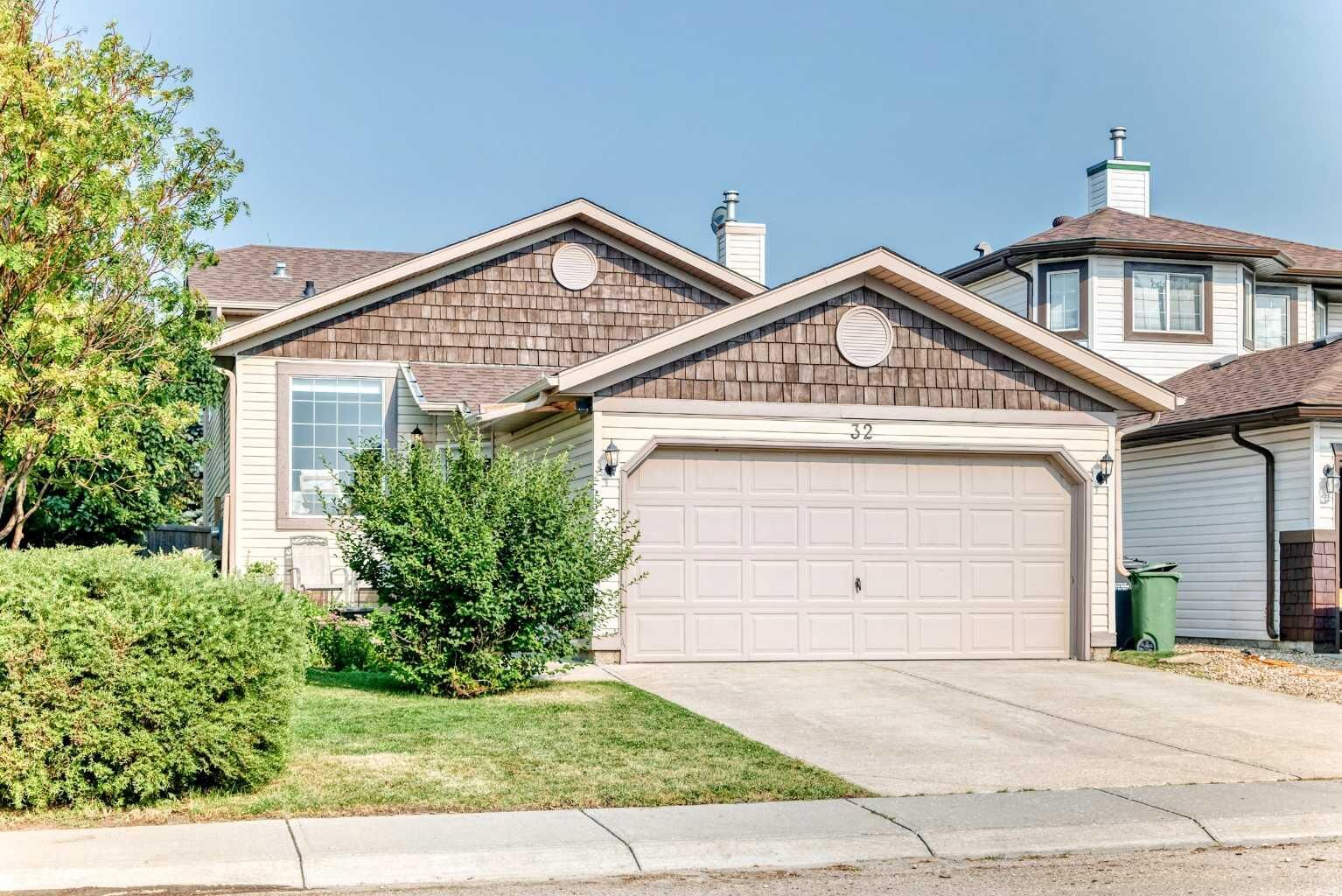 Property Photo: 32 Cimarron Meadows Way AB T1S 1T4