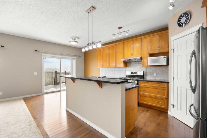 Property Photo: 65 Panora Way NW AB T3K 0R4