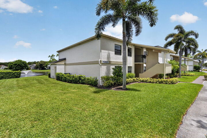 Property Photo:  12829 Briarlake Drive 201  FL 33418 
