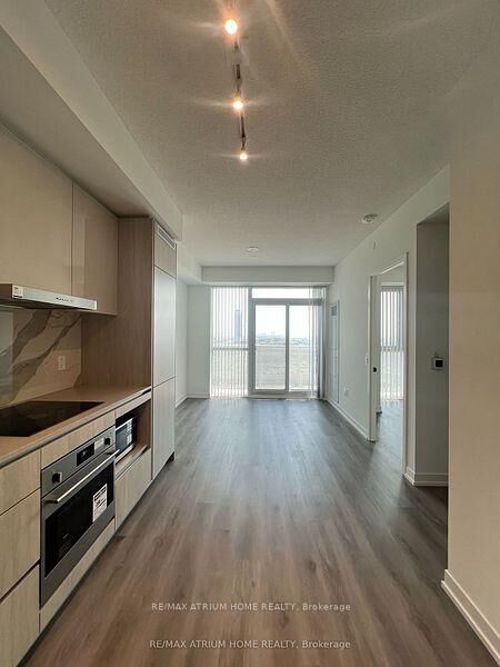Property Photo: 28 Interchange Way 1707 ON L4K 0P8