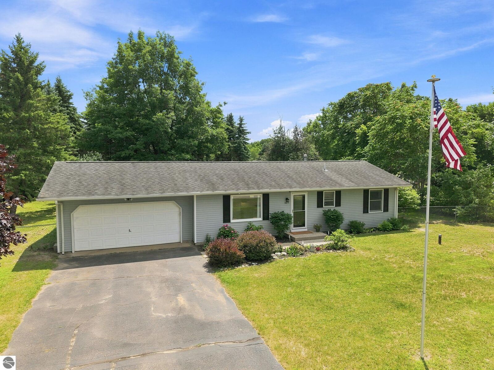 Property Photo:  6075 Beverly Drive  MI 49684 