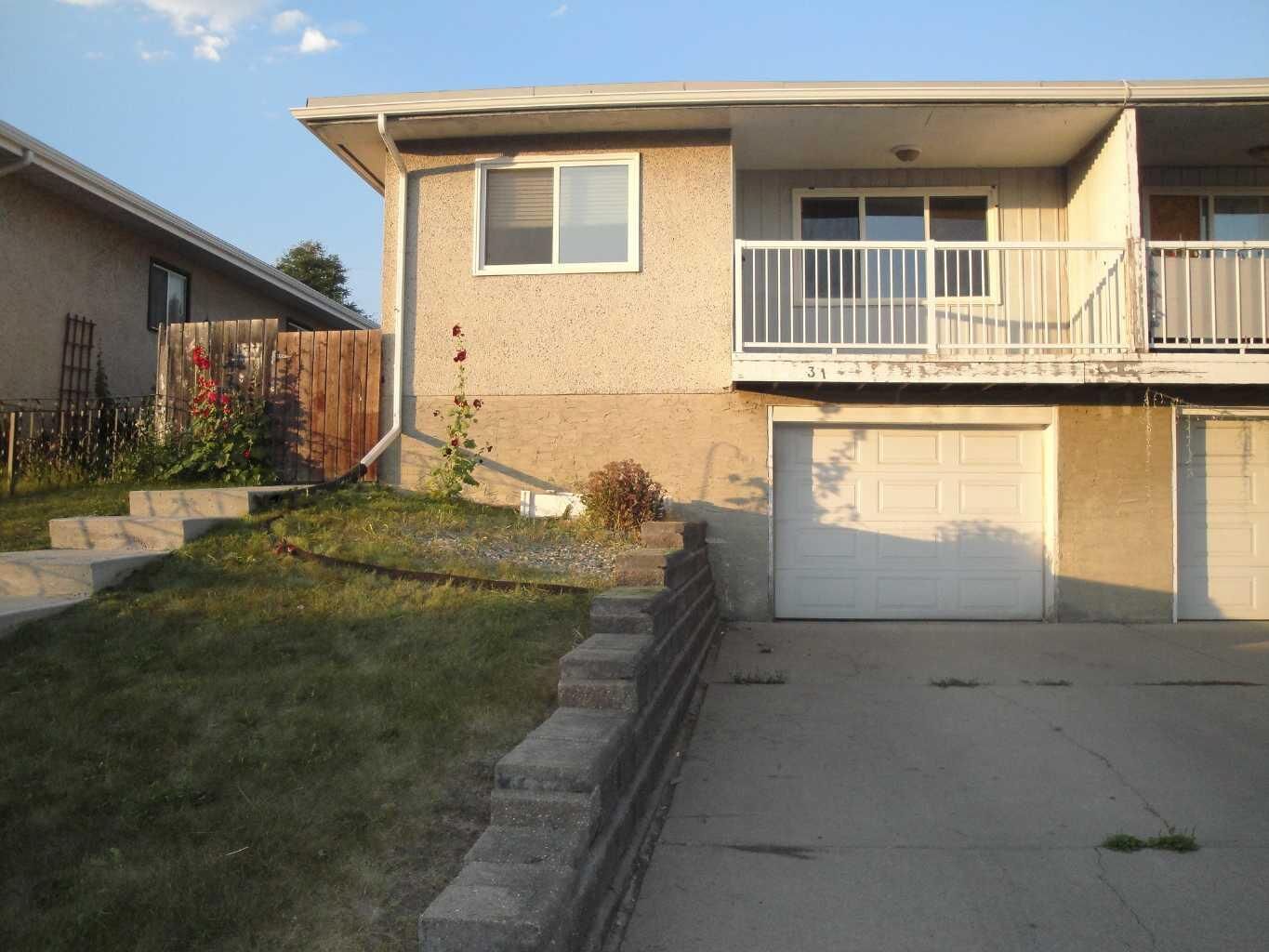 Property Photo:  31 Huntford Road NE  AB T2K 3Y8 