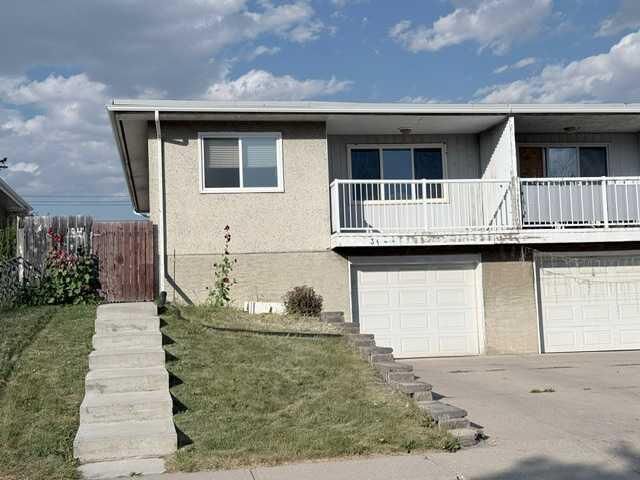 Property Photo: 31 Huntford Road NE AB T2K 3Y8