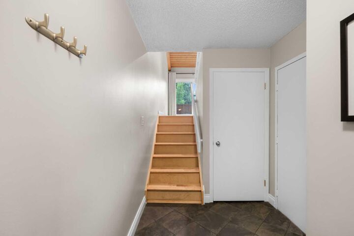Property Photo:  10030 Oakmoor Way SW 52  AB T2V 4S8 
