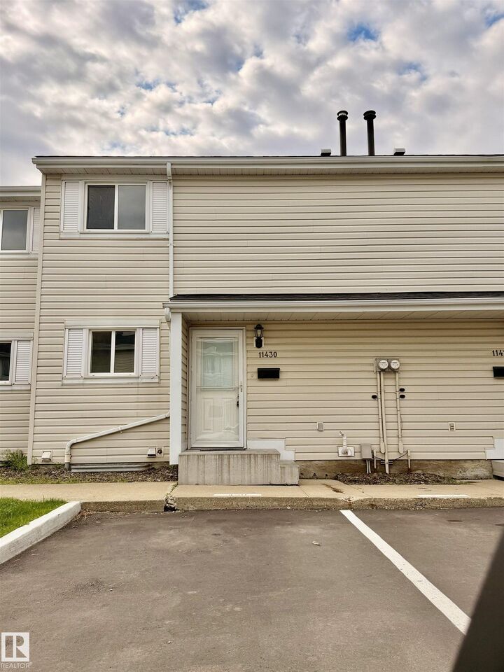 Property Photo:  11430 139 Avenue NW  AB T5X 3L4 