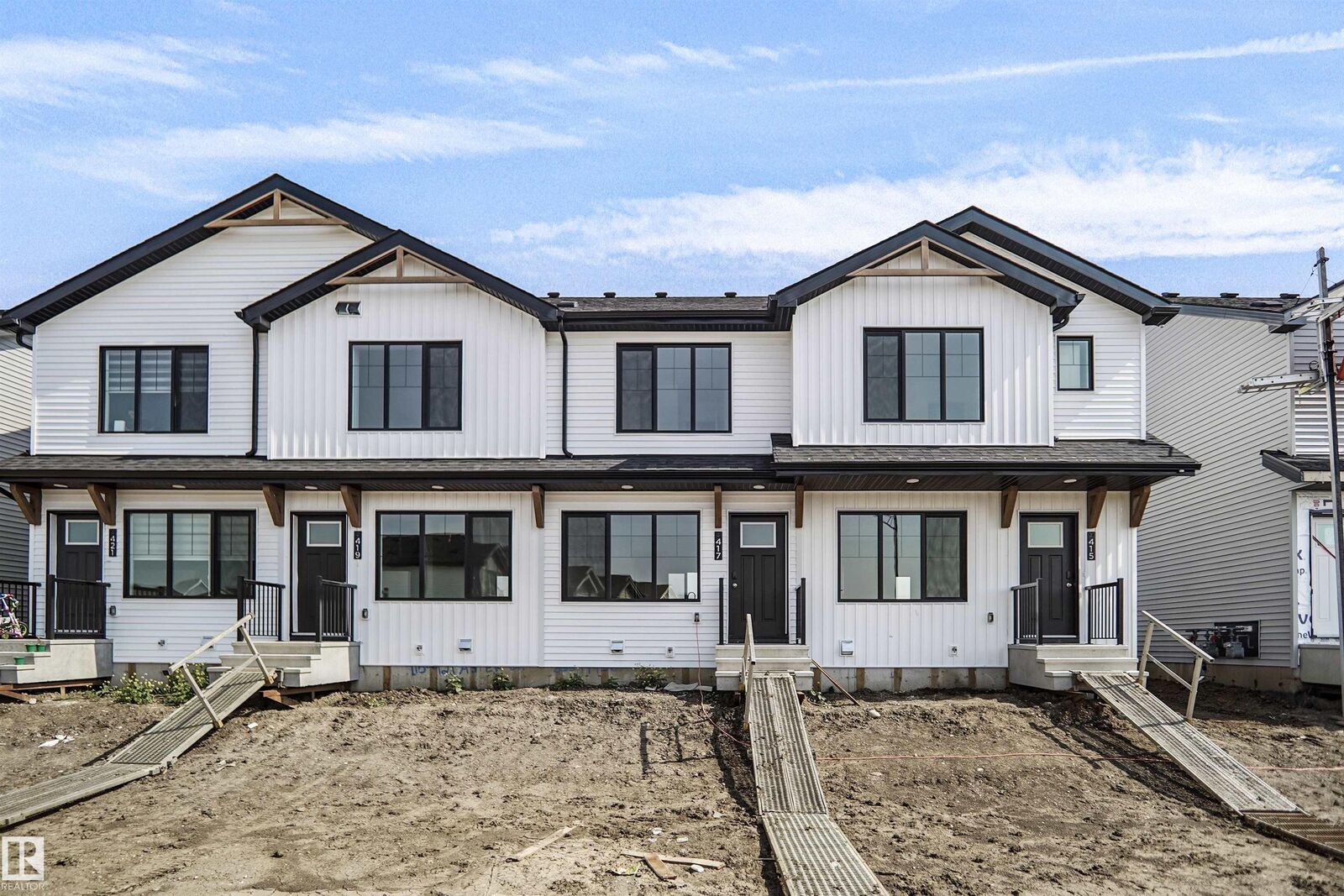 Property Photo: 417 Aster Drive NW AB T6T 2N8