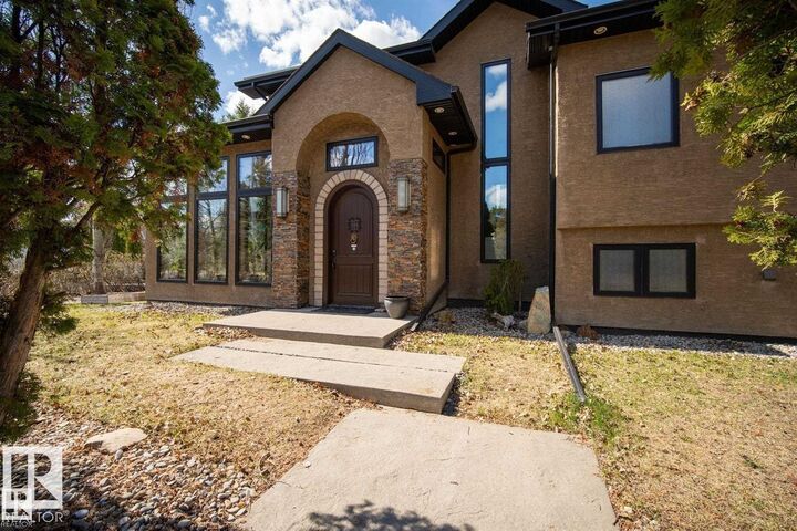 Property Photo: 11908 41A Avenue NW AB T6J 0V9