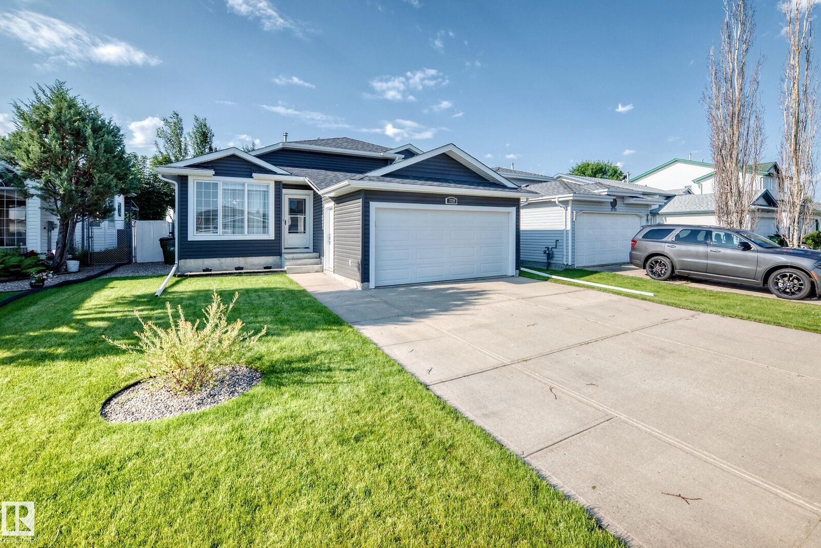 Property Photo: 3729 131A Avenue NW AB T5A 4Y8