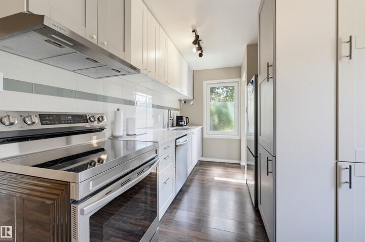Property Photo:  11502 127 Street NW  AB T5M 0V3 