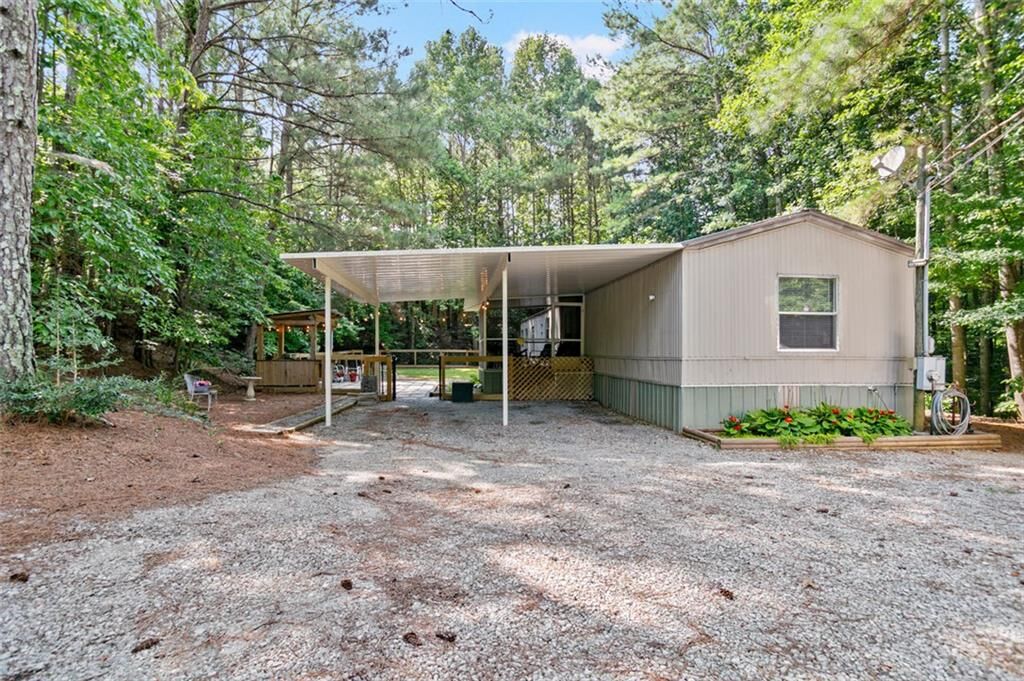 Property Photo:  5002 Bee Tree Road SE  GA 30102 