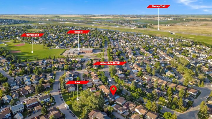 Property Photo:  1174 Abbeydale Drive NE  AB T2A 6L1 