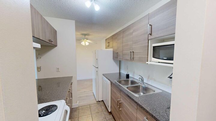 Property Photo: 401 Columbia Boulevard W 212 AB T1K 5R8