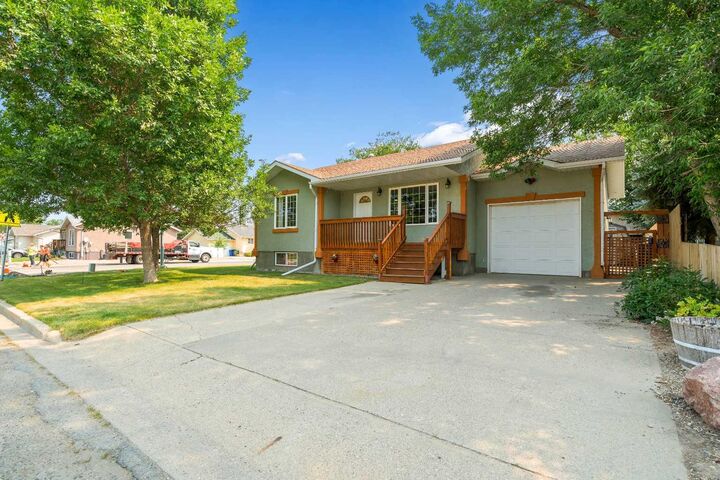 Property Photo: 4129 55 Street AB T1G 1B9