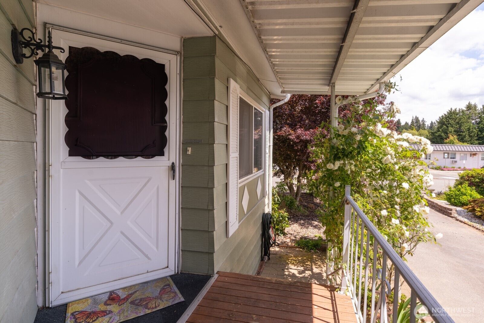 Property Photo:  1121  244th Street SW 19  WA 98021 