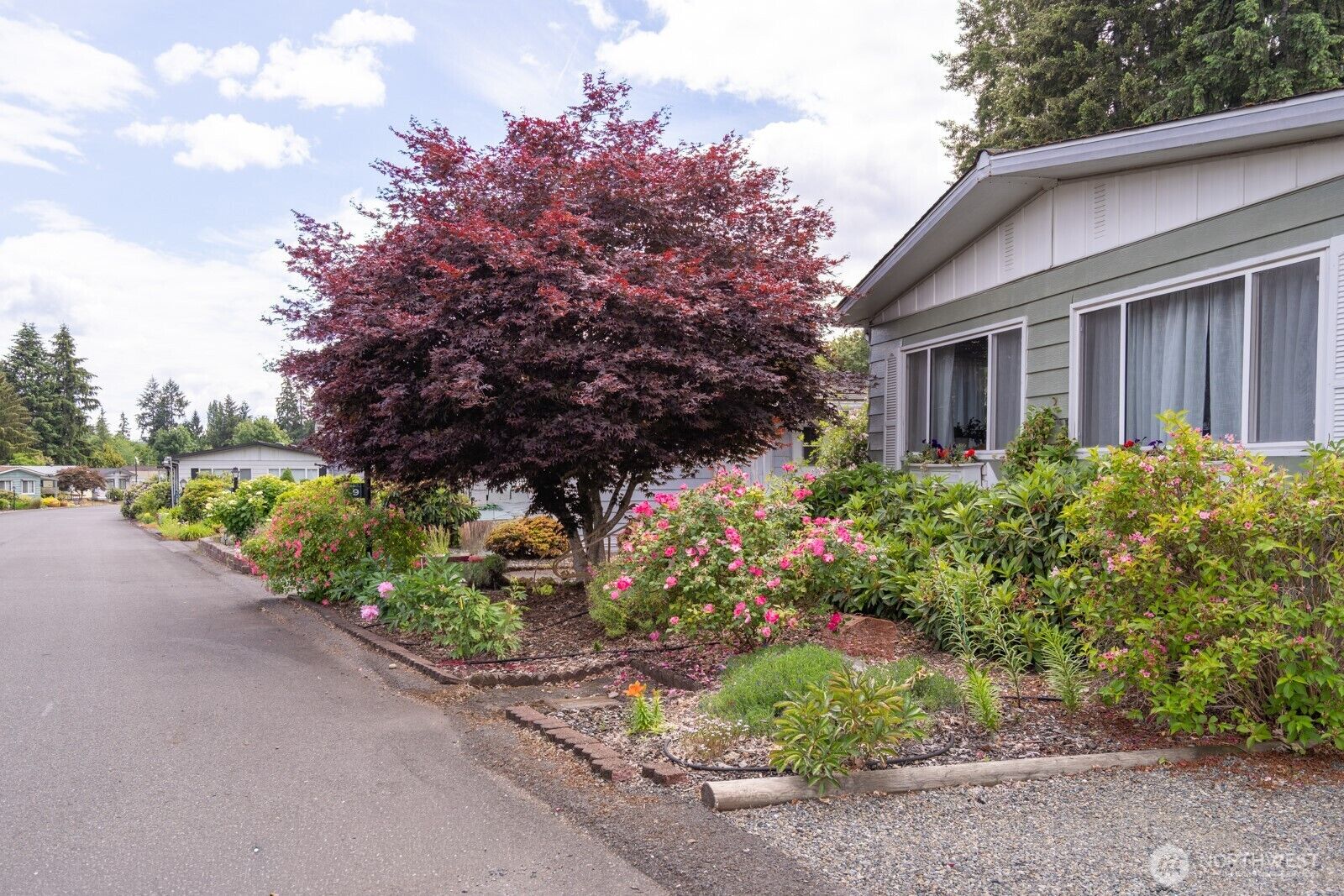 Property Photo: 1121 244th Street SW 19 WA 98021