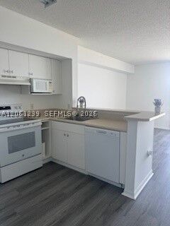 Property Photo:  5077 NW 7 1211  FL 33126 
