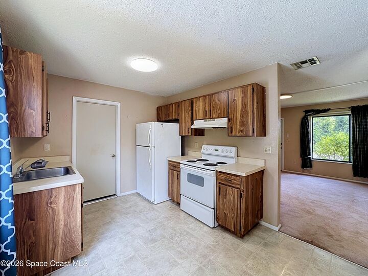 Property Photo:  4705 Sugartown Street  FL 32927 