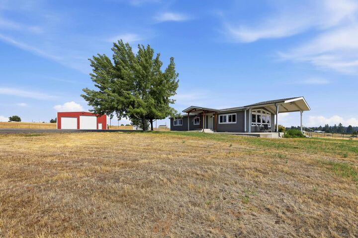 Property Photo:  26910 N Dennison Rd  WA 99006 