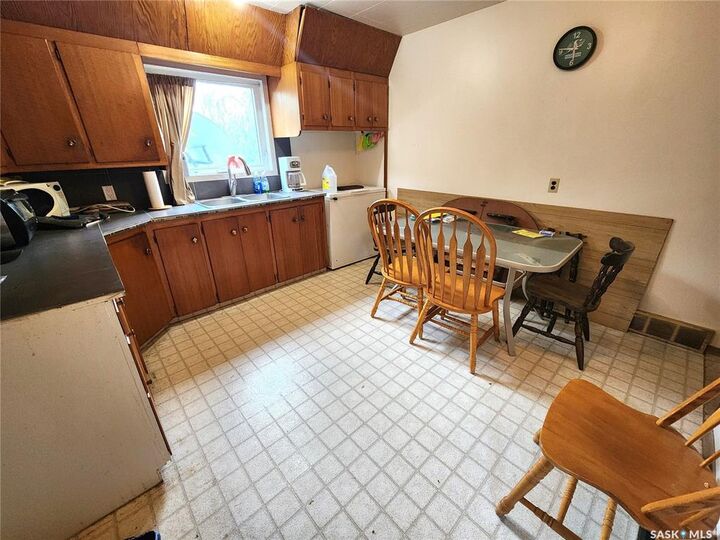 Property Photo:  215 Menzies Street  SK S0C 1W0 