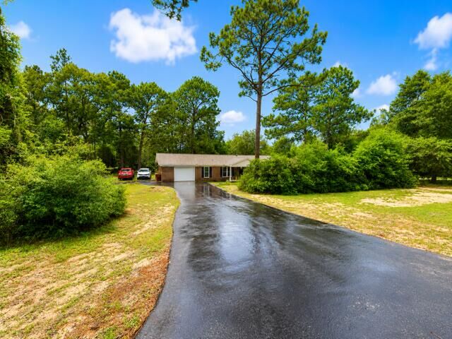 Property Photo:  3999 Painter Branch Road  FL 32539 