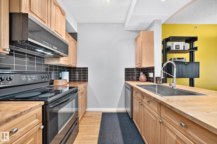 Property Photo: 14259 50 Street NW 421 AB T5A 5J2