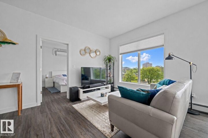 Property Photo:  10837 83 Avenue NW 408  AB T6E 2E6 