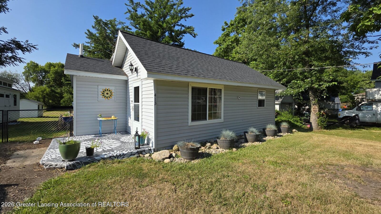 Property Photo:  413 W Howe Avenue  MI 48906 