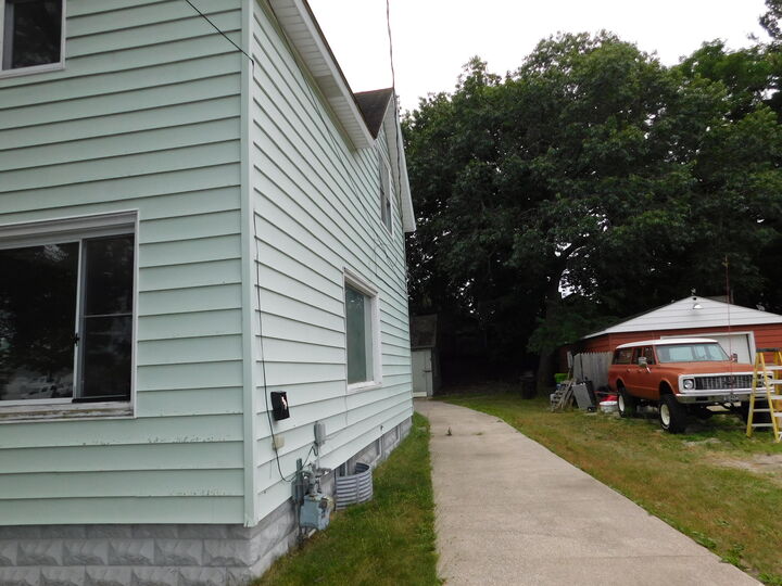 Property Photo:  157 Harrison Street  MI 49660 
