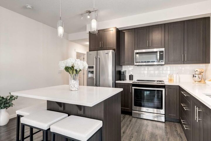 Property Photo:  151 Legacy Main Street SE 7310  AB T2X 4A4 