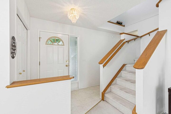 Property Photo: 10521 Hidden Valley Drive NW AB T3A 5W8