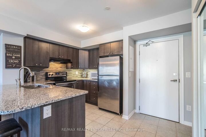 Property Photo: 1045 Nadalin Heights 302 ON L9T 8R5