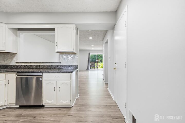 Property Photo:  1 Lily Court  NJ 08820 