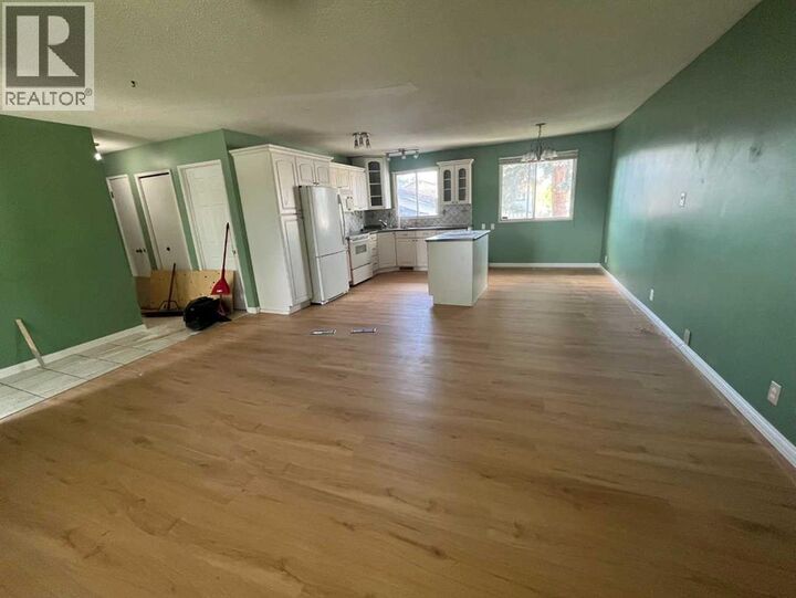 Property Photo:  5820 Rundlehorn Drive Northeast  AB T1Y 2C3 