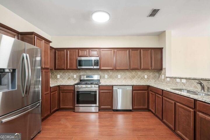 Property Photo: 4805 W Village Way SE 1206 GA 30080