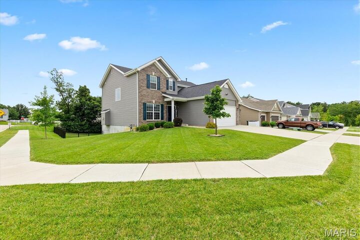 Property Photo:  228 Burrograss Drive  MO 63385 