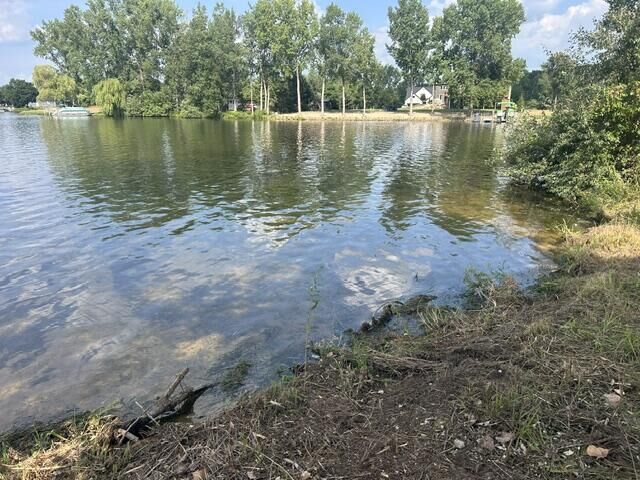 Property Photo: 1002 Channel Drive W MI 48893